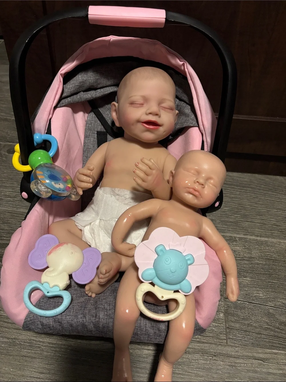 Baby Doll Carrier Set with Pink Fabric Seat and Two Dolls